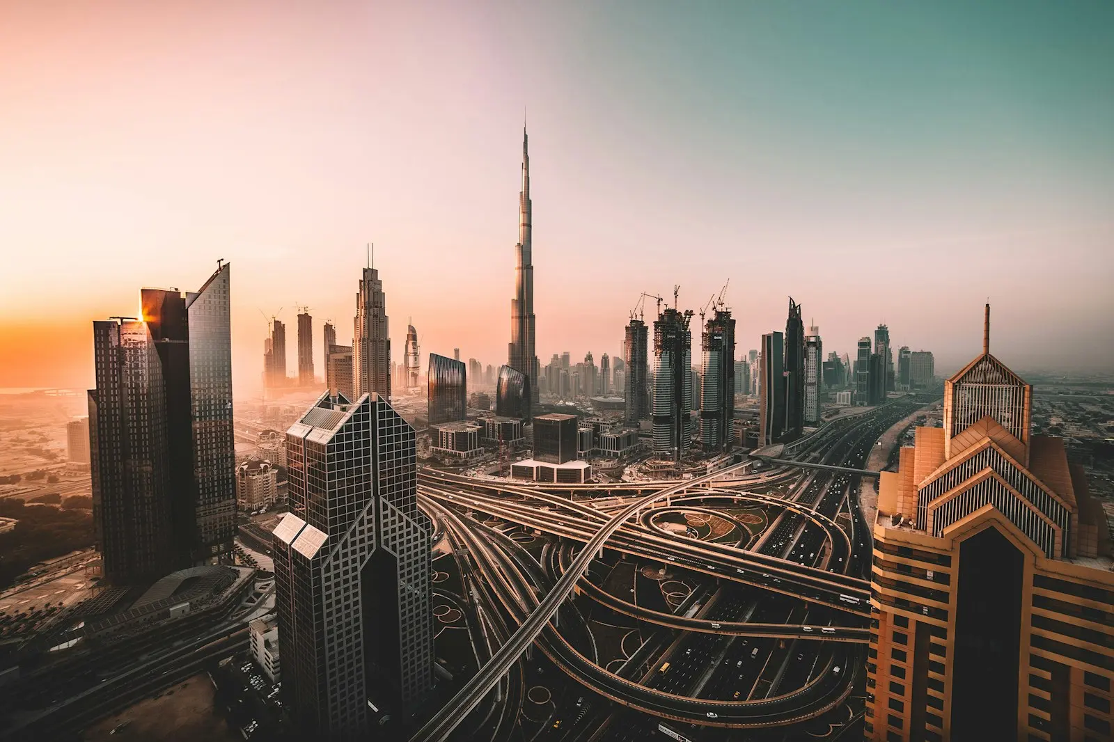 Burj Khalifa and Downtown Dubai above a highway interchange